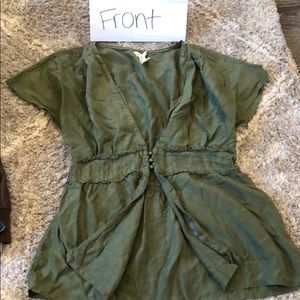 Sinched waist, open front shirt.